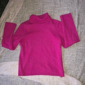 Pink cashmere turtleneck sweater